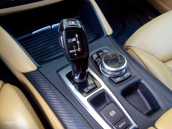 Jaunā BMW iDrive multimediju kontrolleru paplāksne (foto #4)