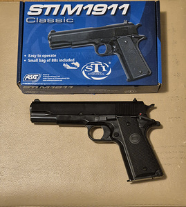Спринговый пистолет m1911 ASG новый (2 фото из 2)