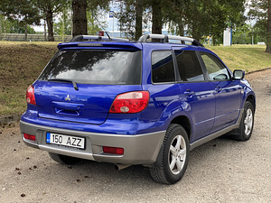 Mitsubishi Outlander | Бензин | мануал (3 фото из 6)