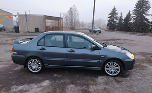 Mitsubishi Lancer Sport (5 foto / 12)