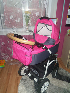 Розовая детская коляска 3в1