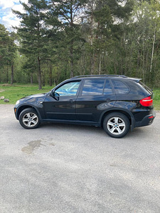 BMW X5 2009 (2 foto / 9)