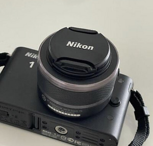Nikon 1 J1 + 10-33mm objective (2 foto / 2)