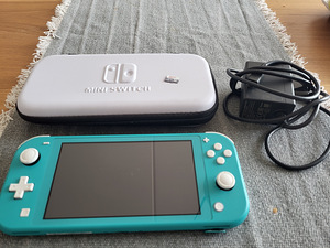 Nintendo Switch Lite + Zelda + 64Gb SD + Case (1 foto / 2)