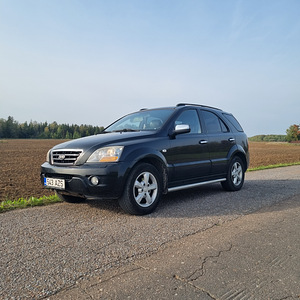 Kia Sorento 2007 (5 foto / 10)