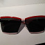 Солнцезащитные очки Prada (фото #1)