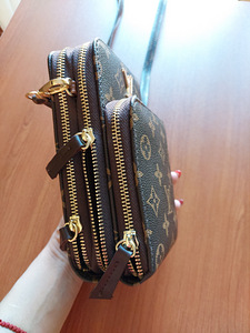 Louis Vuittoni crossbody kott (2 foto / 6)