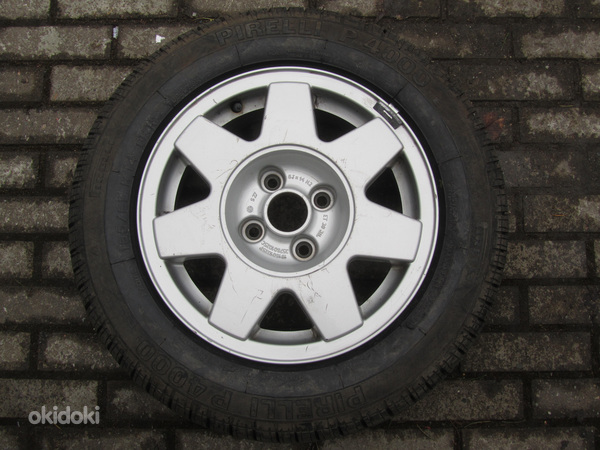 Запасное колесо VW, литой диск R14 4x100 с резиной 7 мм (фото #1)