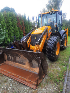 Погрузчик-экскаватор JCB 4CX (1 фото из 7)