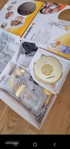 Двухфазный электрический молокоотсос Medela