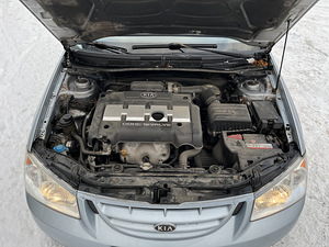 Kia Cerato 2005 (7 фото из 13)