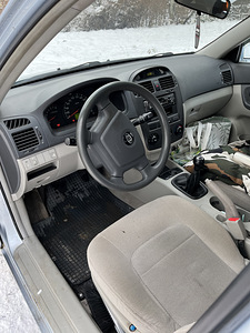 Kia Cerato 2005 (9 фото из 13)
