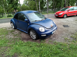 Volkswagen new beetle (4 foto / 6)