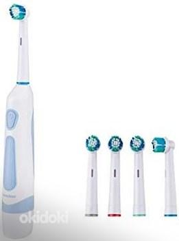 Nevadent Electric toothbrush with 4 brush новая в упаковке (фото #2)