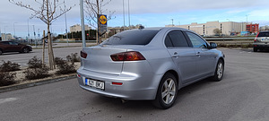 Mitsubishi lancer x 2009 2.0 tdi (2 foto / 8)