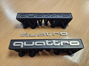 Эмблема Quattro для решетки Audi 100 200 C3 (1 фото из 8)