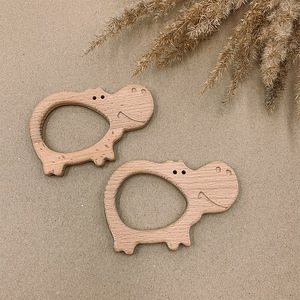 Деревянные жевательные игрушки (2 фото из 10)