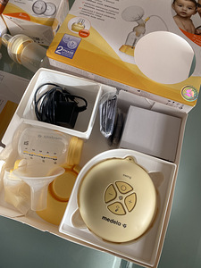 Medela elektriline rinnapump, uued pudelid ja padjad (2 foto / 3)