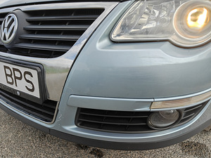 Helesinine automaatkastiga Volkswagen Passat 2005 (7 foto / 15)