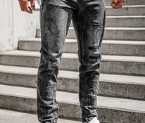 Черные джинсы с эффектом потертости 33L