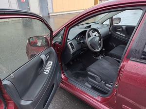 Suzuki Liana (9 foto / 15)