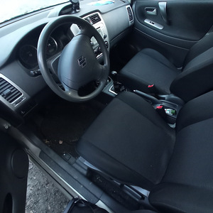 Suzuki liana 2007 бензин (8 фото из 9)