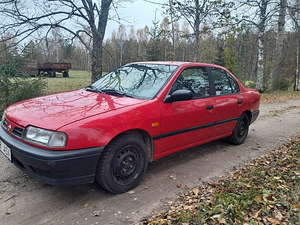 Nissan Primera 1,6 66 kW (2 foto / 10)