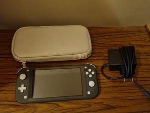 Nintendo switch lite + чехол + 3 игры (1 фото из 4)