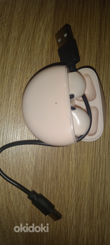 Juhtmevabad kõrvaklapid koos laadijaga (roosad) (foto #1)